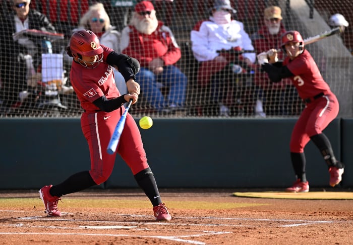 Oklahoma slugger Jocelyn Alo hits the ball during an NCAA softball game.